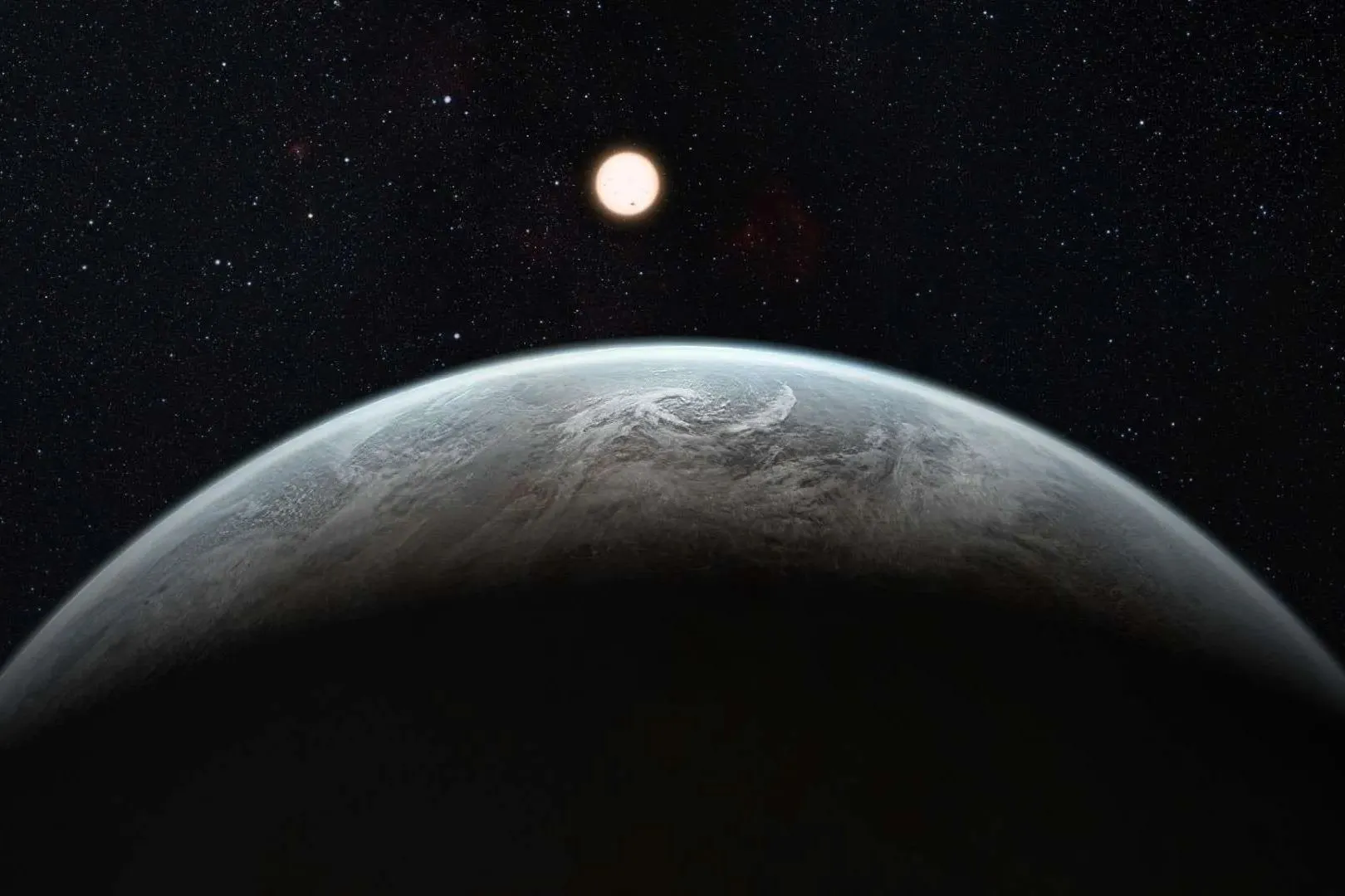 Representación artística de un planeta rocoso girando en torno a una estrella distante